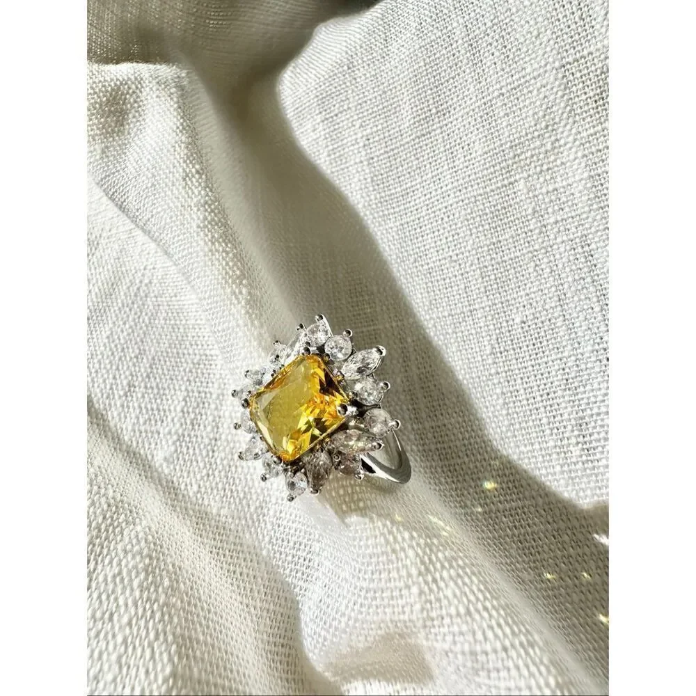 Yellow elongated radiant cut canary cubic zirconia cocktail ring